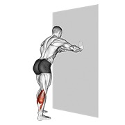 Calf stretch with hands against wall