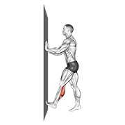 Calf push stretch with hands against wall